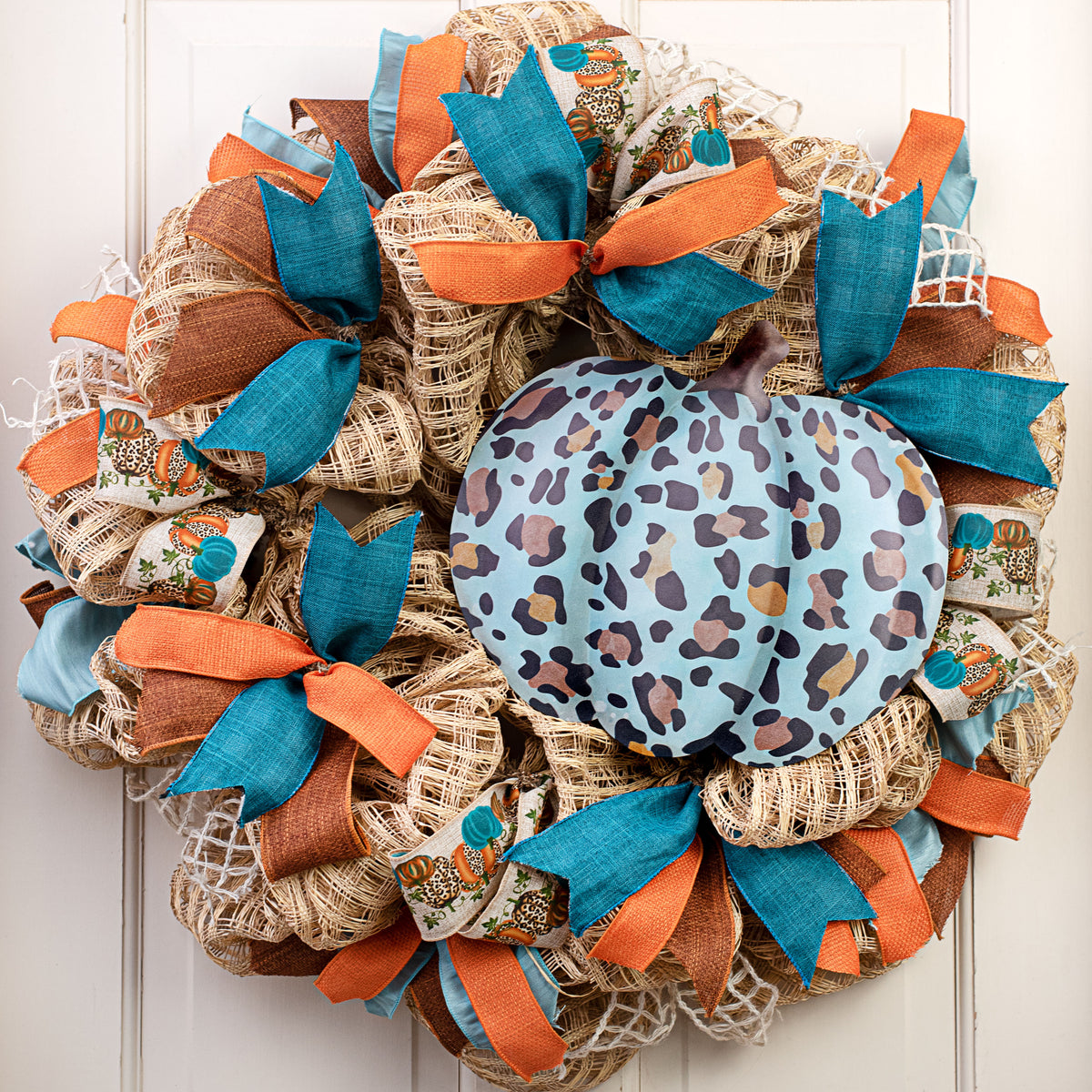 12" Metal Embossed Hanger: Teal Leopard Pumpkin Lifestyle Photo