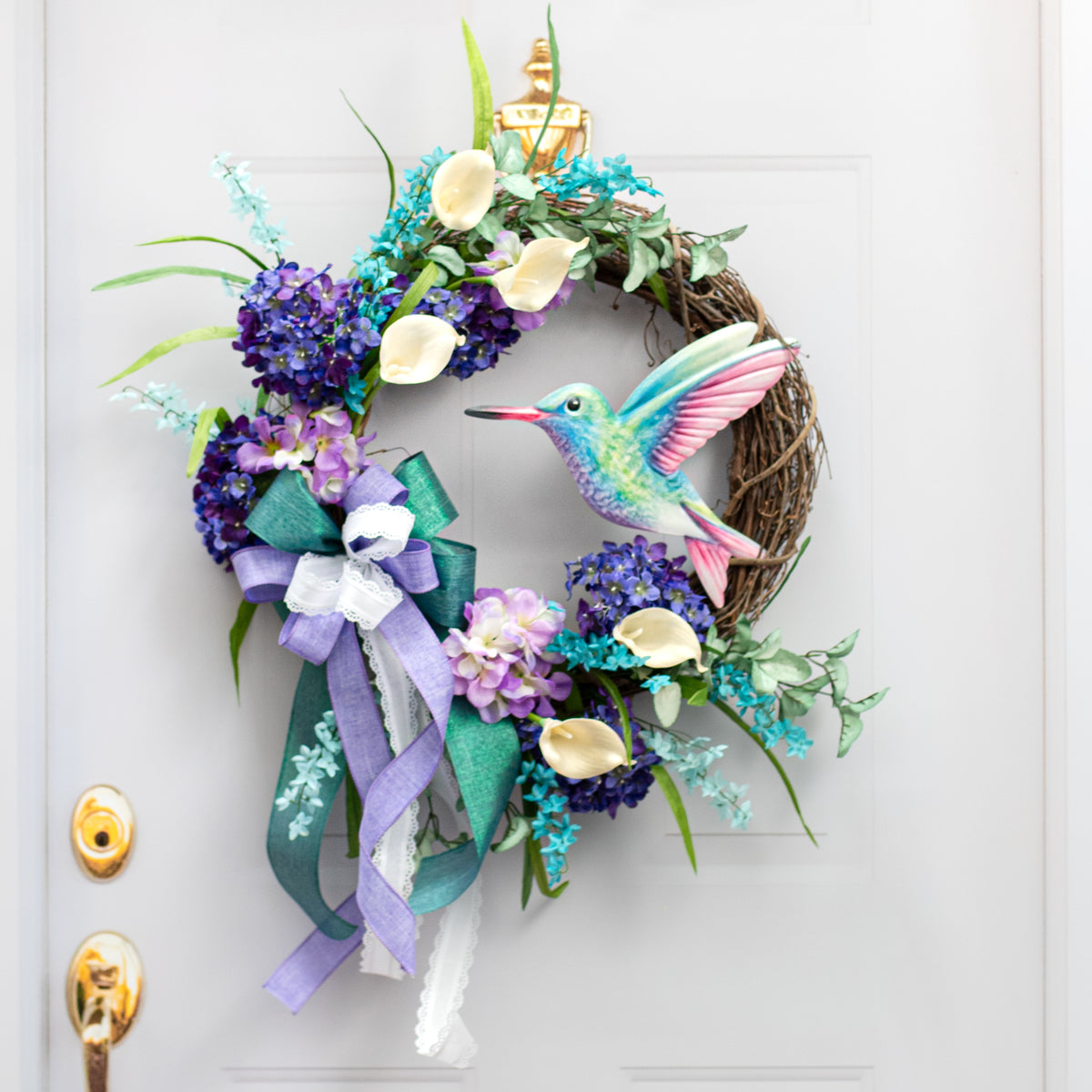 12" Metal Embossed Sign: Green & Pink Hummingbird Lifestyle Photo
