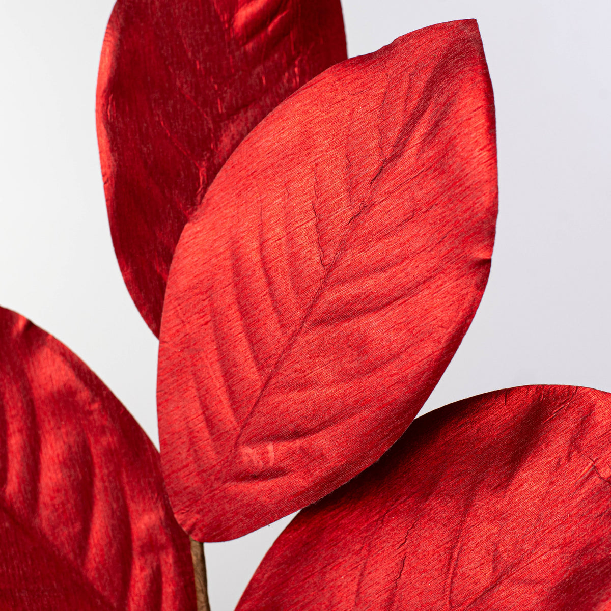 37" Metallic Fabric Magnolia Leaves Spray: Red Lifestyle Photo