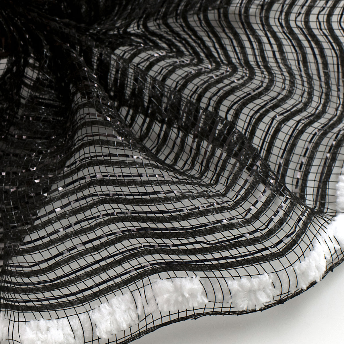 10" Metallic Fat Snow Edge Breeze Mesh: Black (5 Yards) Lifestyle Photo