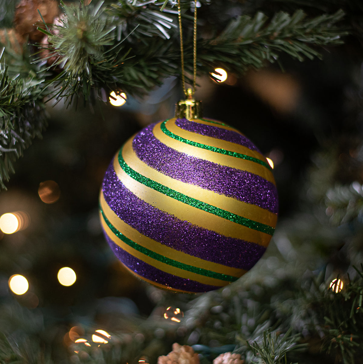 100MM Diagonal Glitter Stripe Ball Ornament: Mardi Gras Lifestyle Photo