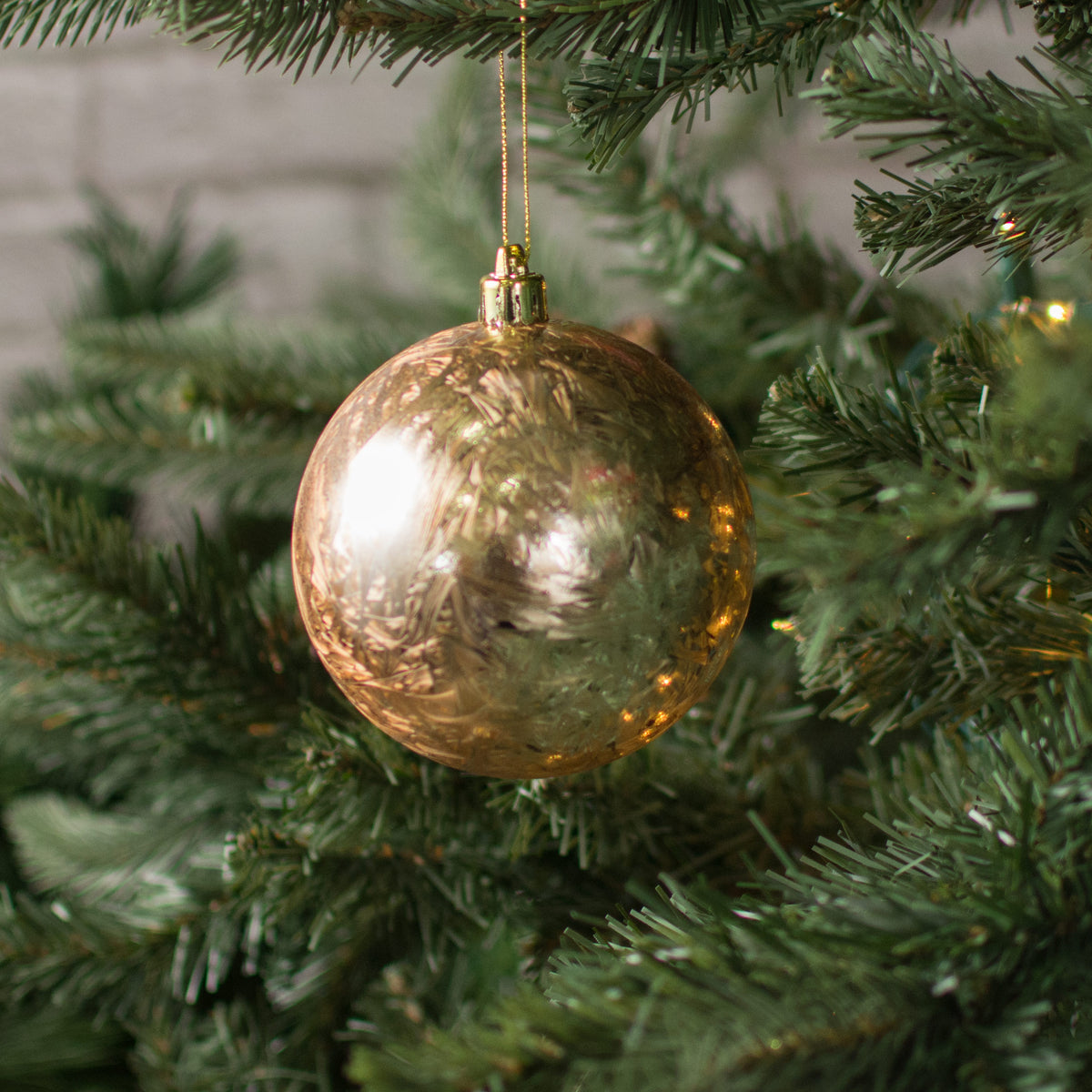 100MM Feather Smooth Ball Ornament: Rose Gold Lifestyle Photo