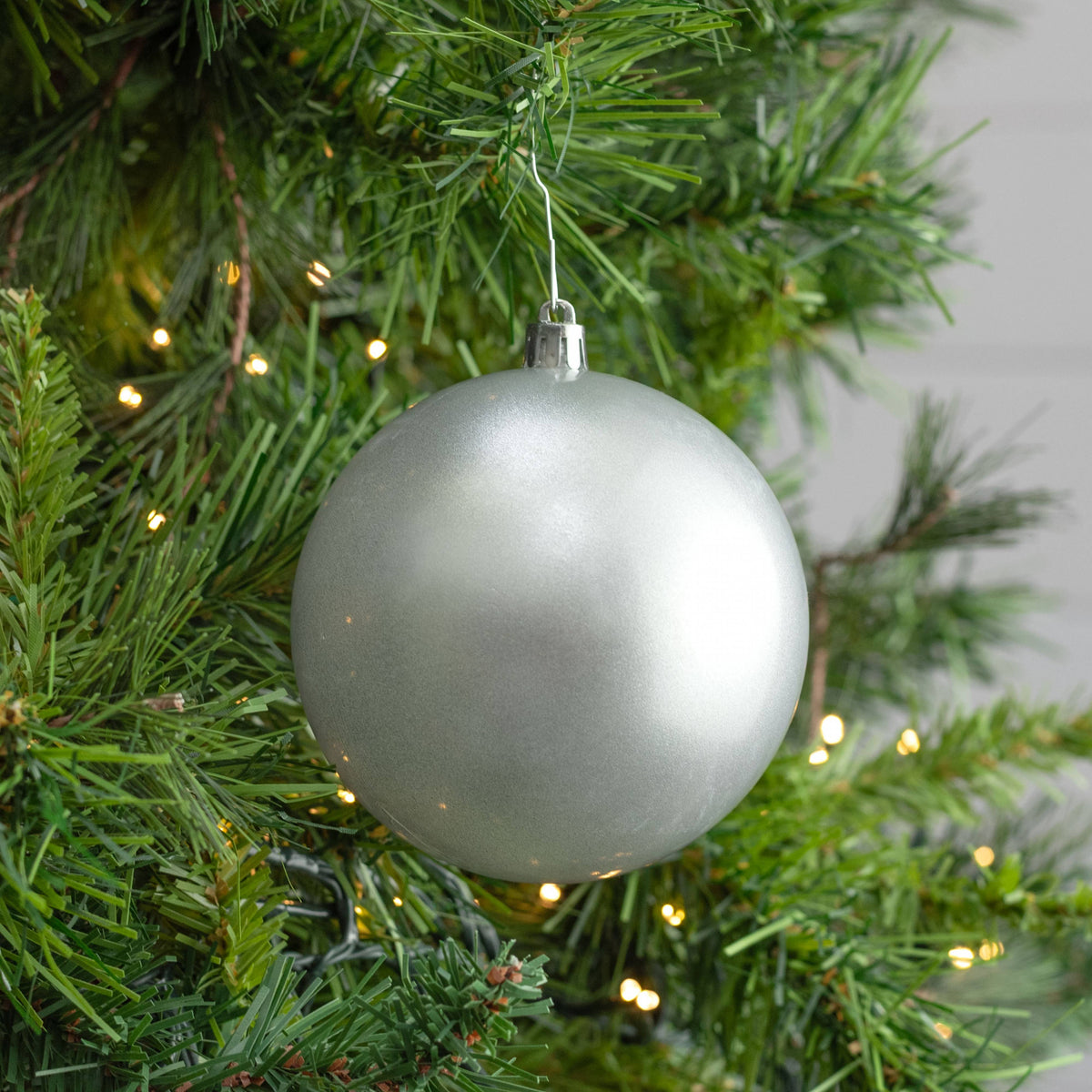100MM Plastic Ball Ornament: Candy Apple Silver (Set of 4) Lifestyle Photo