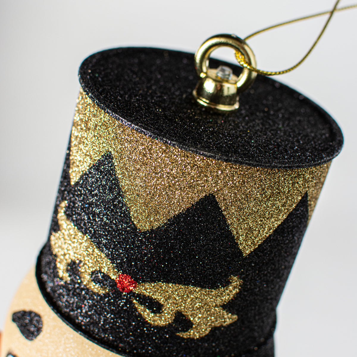 8.5" Nutcracker Ornament: Black & Gold detail photo 3