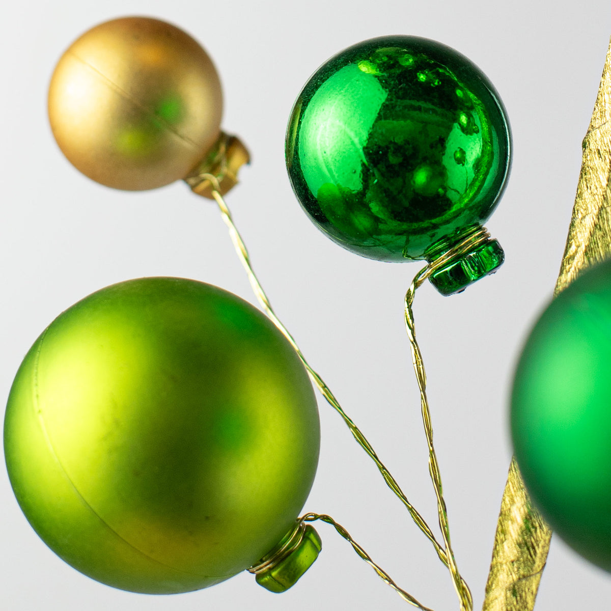 16" Ornament Pick: Green & Gold Lifestyle Photo