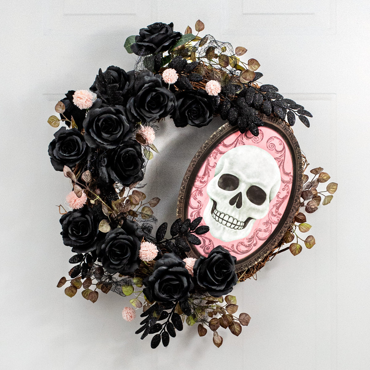 13" Oval Wooden Sign: Light Pink Framed Skull Lifestyle Photo