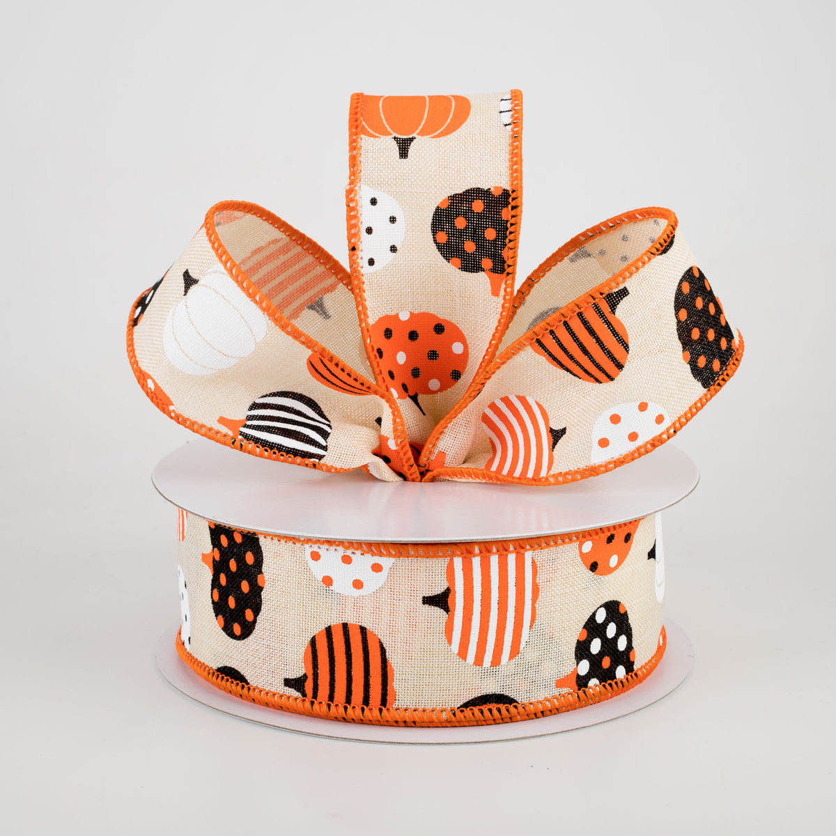 1.5" Patterned Pumpkins Ribbon: Cream, Orange, Black (10 Yards) Lifestyle Photo
