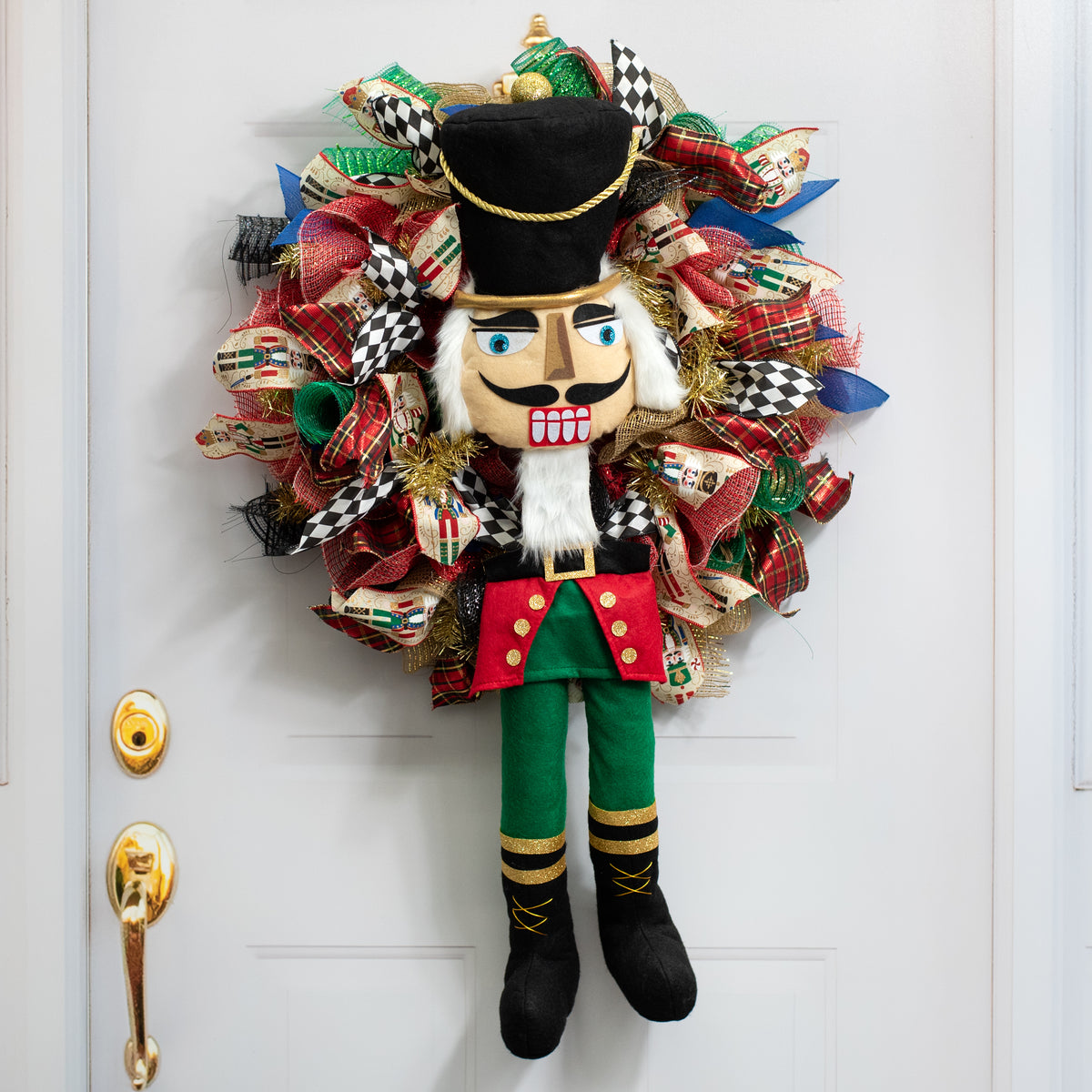 33" 2-Piece Nutcracker Wreath Accent: Black, Emerald & Red Lifestyle Photo