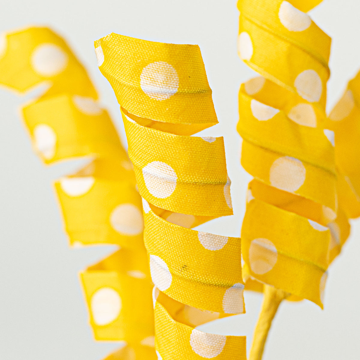 16" Polka Dot Curly Pick: Yellow Lifestyle Photo