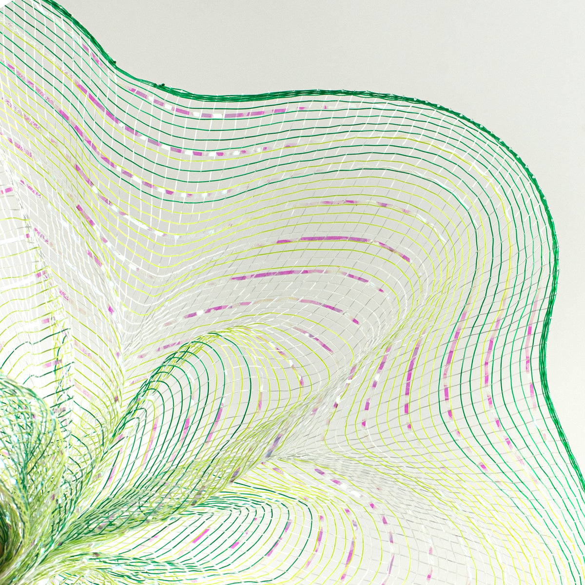 10" Poly Deco Mesh: Green Iridescent Ombré Lifestyle Photo