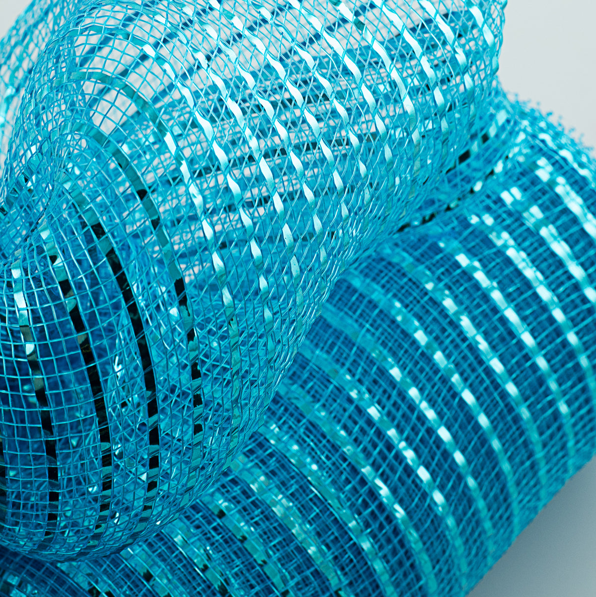 10" Poly Deco Mesh: Wide Foil Metallic Turquoise Lifestyle Photo