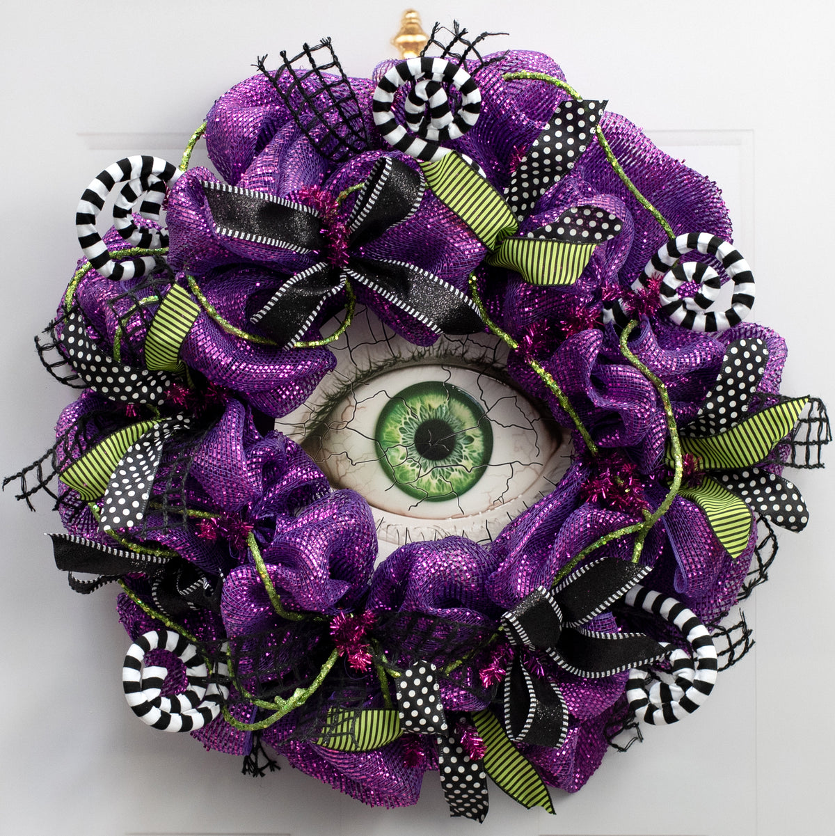 10.5" Round Waterproof Sign: Crackle Texture Creepy Eye Lifestyle Photo