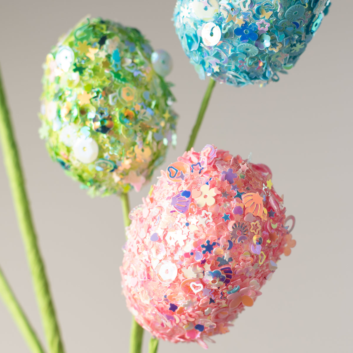 29" Sequin Glitter Easter Egg Spray: Iridescent Pink, Yellow, Green Lifestyle Photo