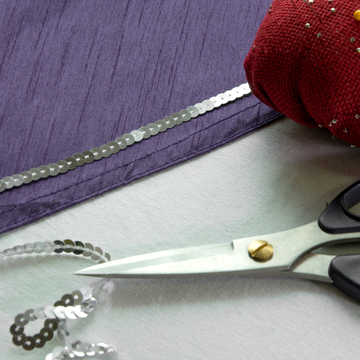 0.25" Sequin Trim: Metallic Silver (100 Yards) Lifestyle Photo