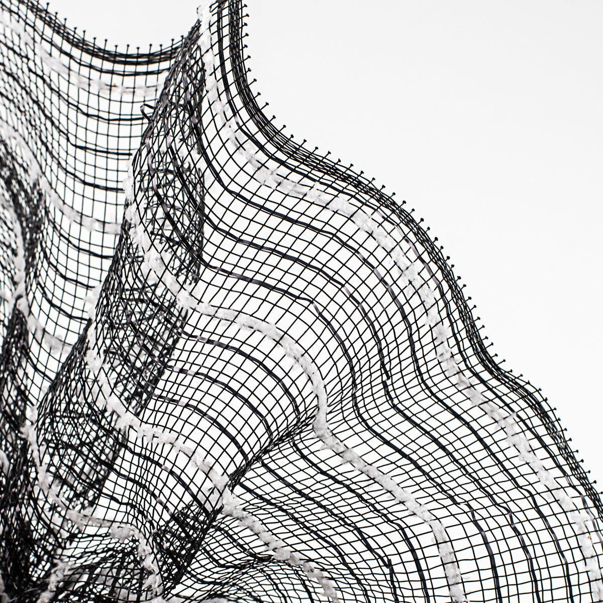 10" Snowdrift Deco Mesh: Black Foil & White Lifestyle Photo