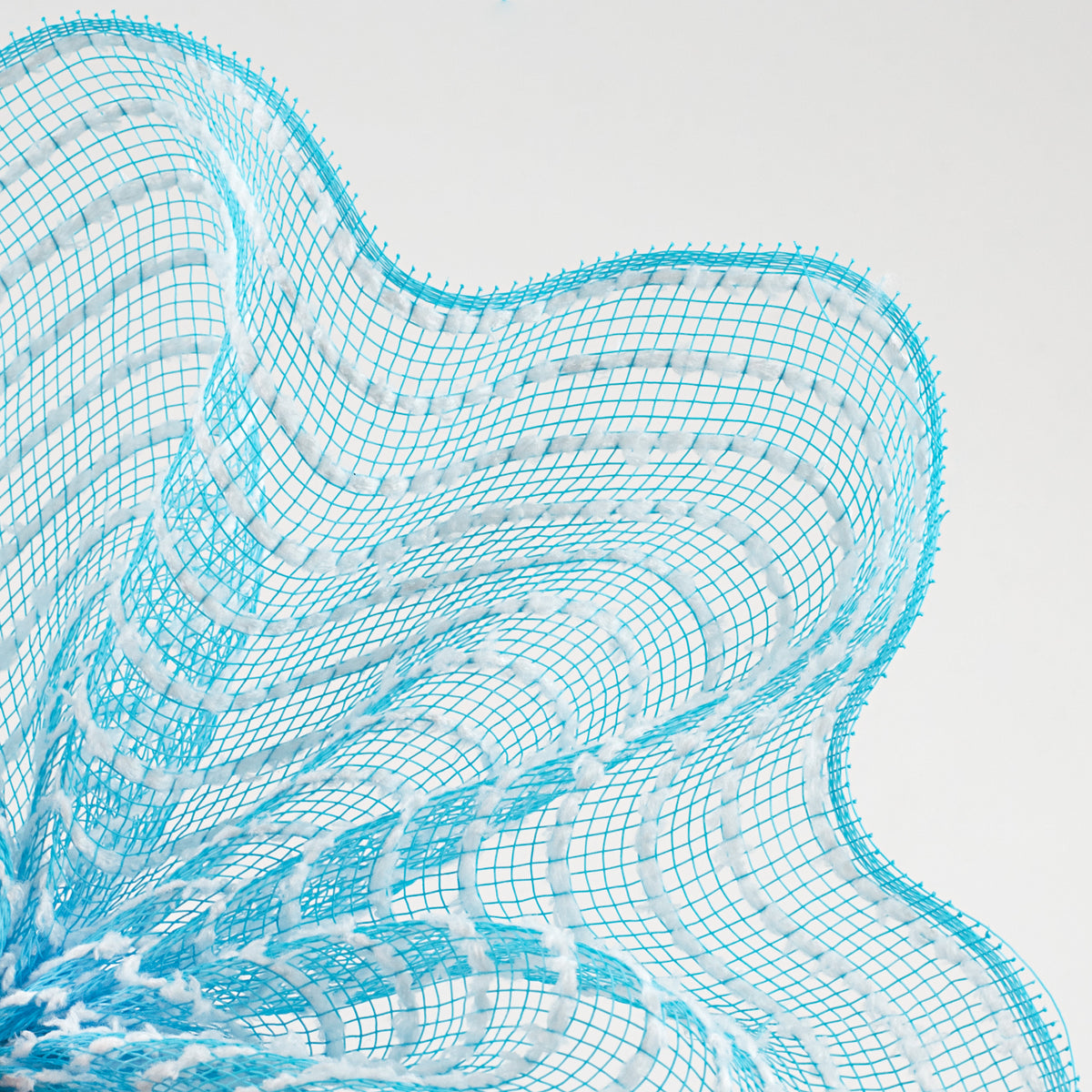 10" Snowdrift Deco Mesh: Turquoise & White Lifestyle Photo