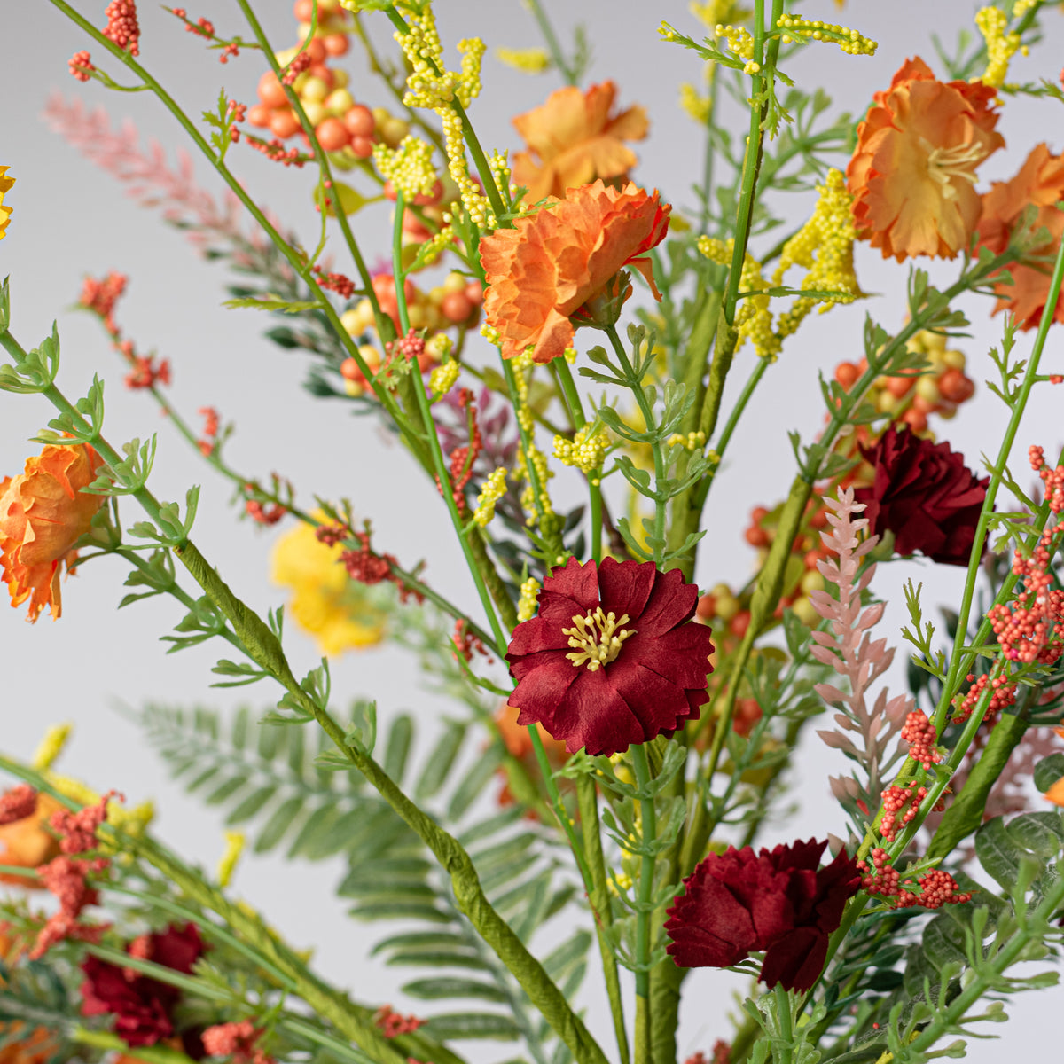 20" Spring Mini Flower Spray: Orange, Red & Yellow Lifestyle Photo