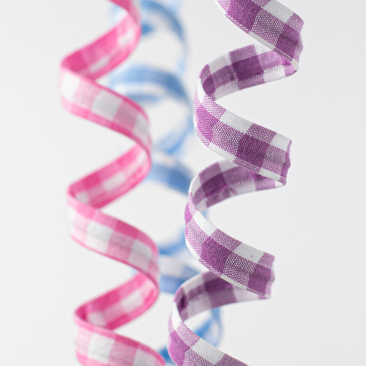 18" Swirled Check Ribbon Spray: Blue, Purple, Pink Lifestyle Photo