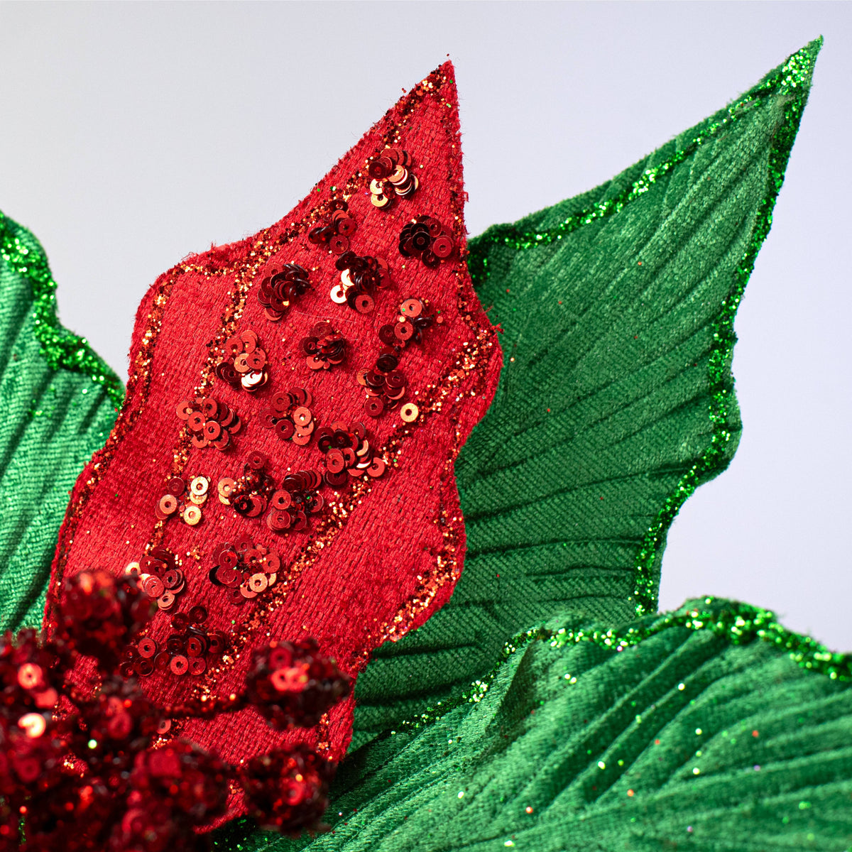 14" x 26" Velvet Sequin Poinsettia Stem: Red & Emerald Green Lifestyle Photo