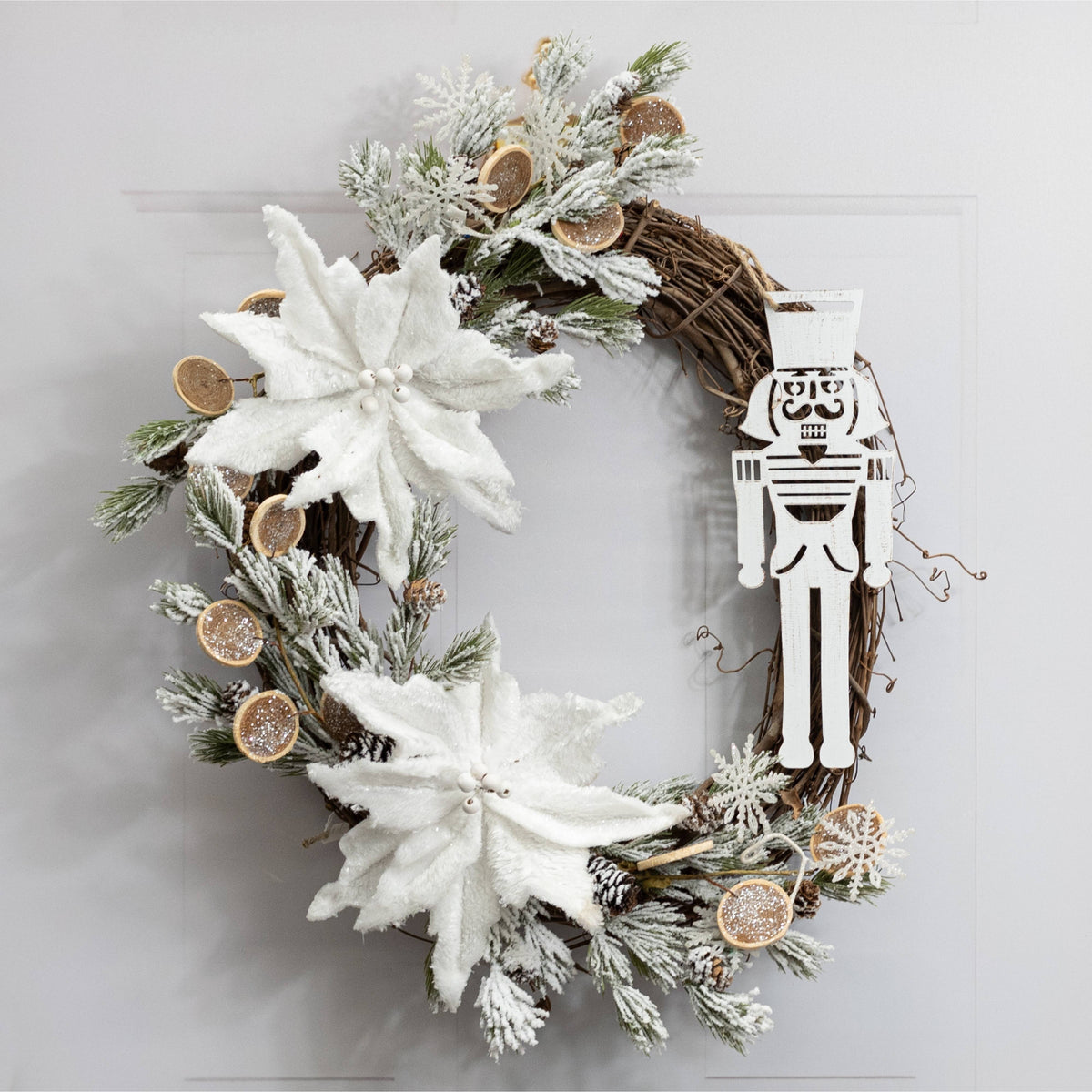 12" Vintage Metal Nutcracker Ornament: White Lifestyle Photo